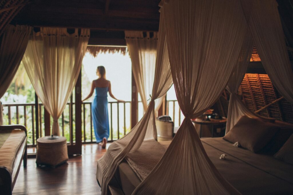 Woman Leaning on Handrail in Room(Luxury Travel)